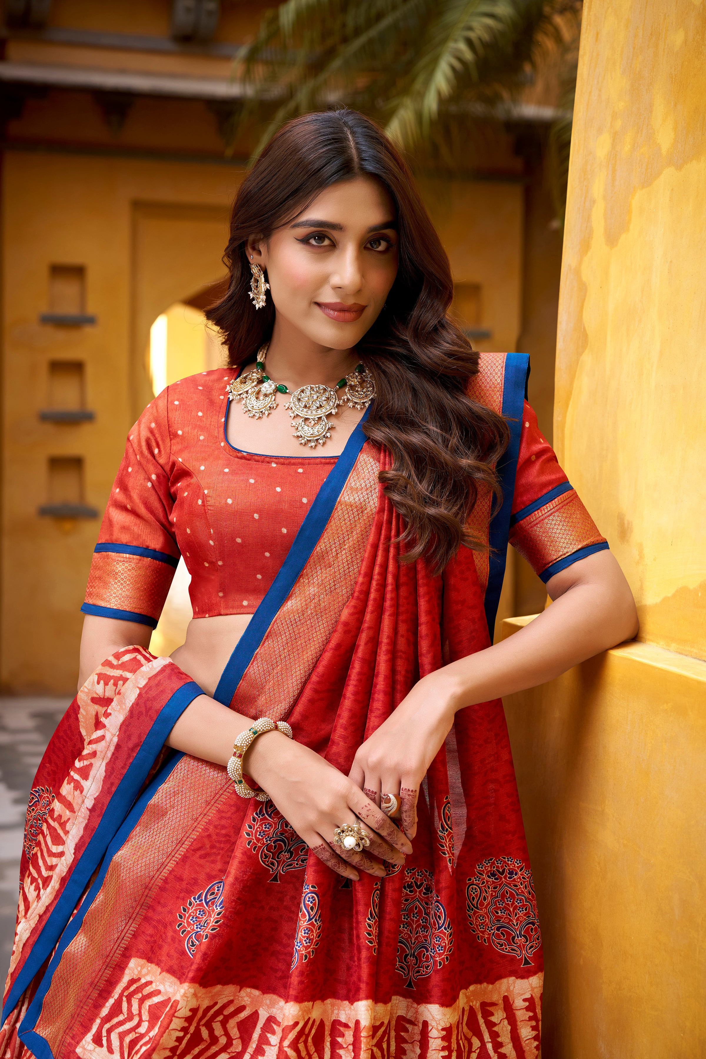 Girija Rust Orange Dola Silk Batik Print With Zari
Weaving Work Lehenga Choli