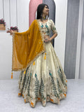 Tarini yellow tissue silk embroidered lehenga choli