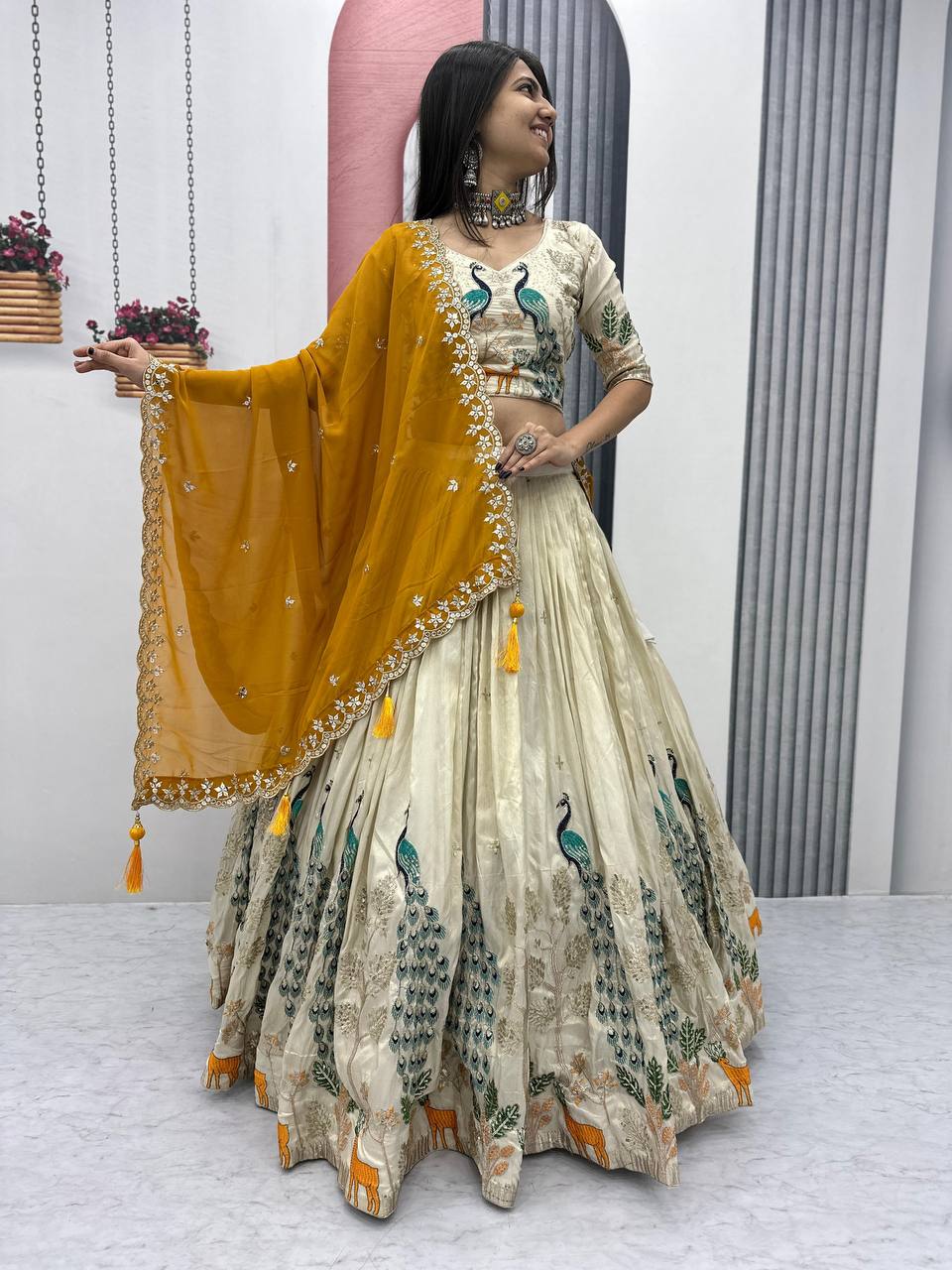 Tarini yellow tissue silk embroidered lehenga choli