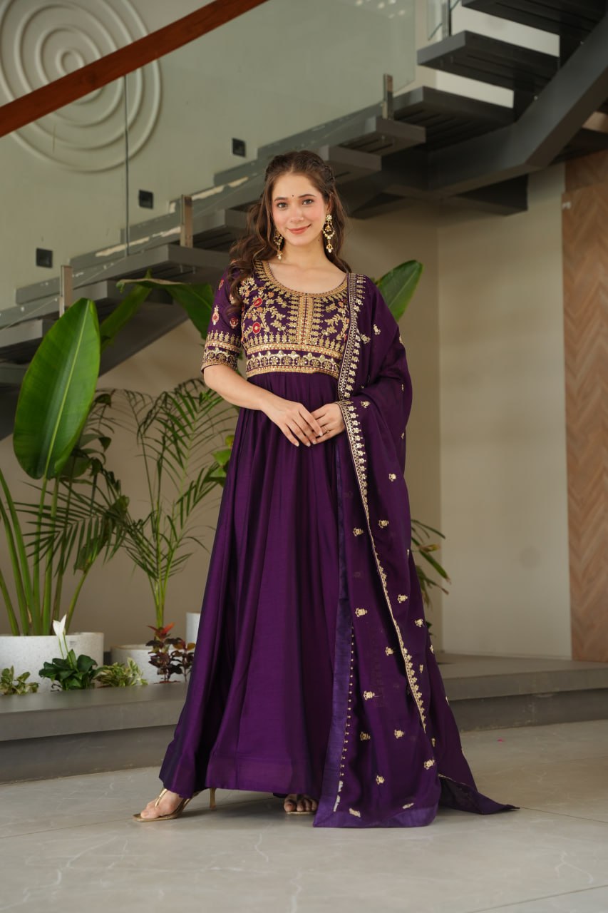 Aadishri Purple Vichitra Silk Gown with multi-sequins and zari embroidery – perfect Indian ethnic wear for weddings, party wear dresses for women, designer gown for women, traditional Indian dress, Indian clothing for women, ethnic wear for girls, gown for wedding function, Indian dress online shopping, full sleeve gown for women, festive wear for ladies.