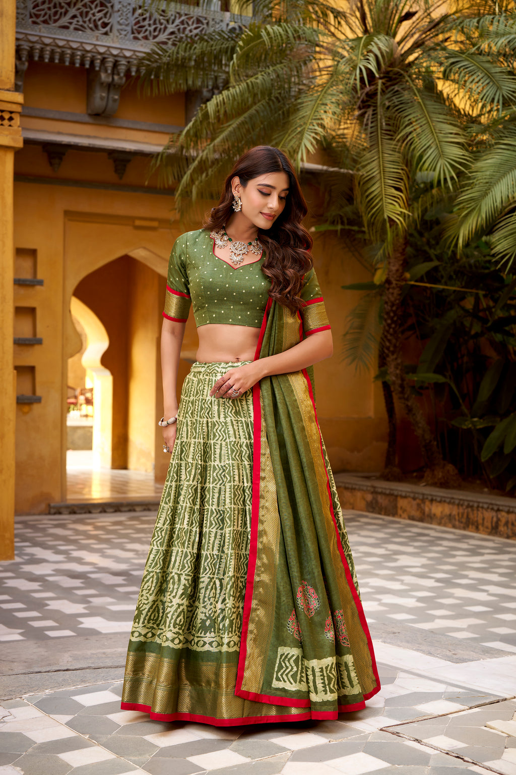 Girija Mehendi Green Dola Silk Batik Print With Zari
Weaving Work Lehenga Choli