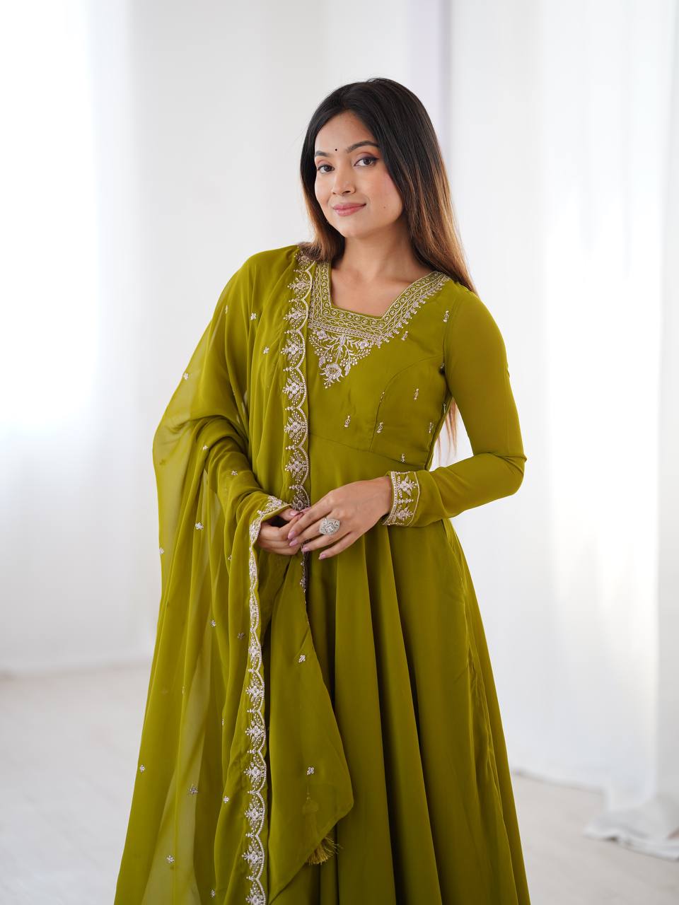 Green Anarkali suit in soft Fox Georgette with 6.5-meter flair, beads & zari embroidery, lace sleeves & dupatta – fully stitched & party-ready.
