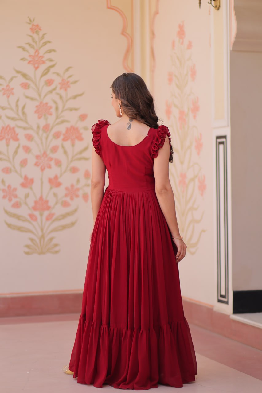 Lavi 7-meter flared designer gown in faux blooming fabric with sequin & bead embroidery, V-neck & frill shoulders – perfect for weddings & parties.