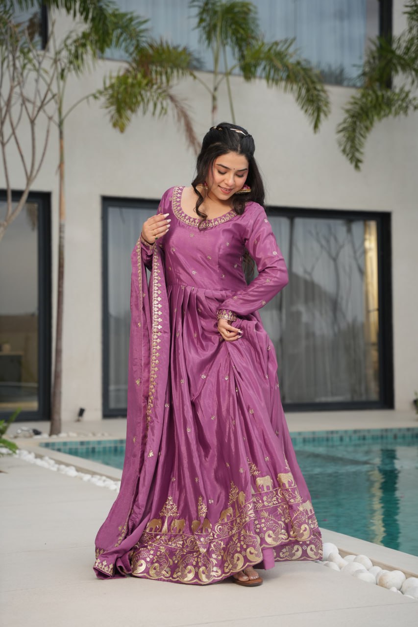 Harvisha mauve purple Chinon silk embroidered gown with full sleeves, floor-length 56-inch flair, rich sequin detailing, and matching embroidered dupatta – ideal Indian ethnic party gown for weddings, receptions, and festive occasions.