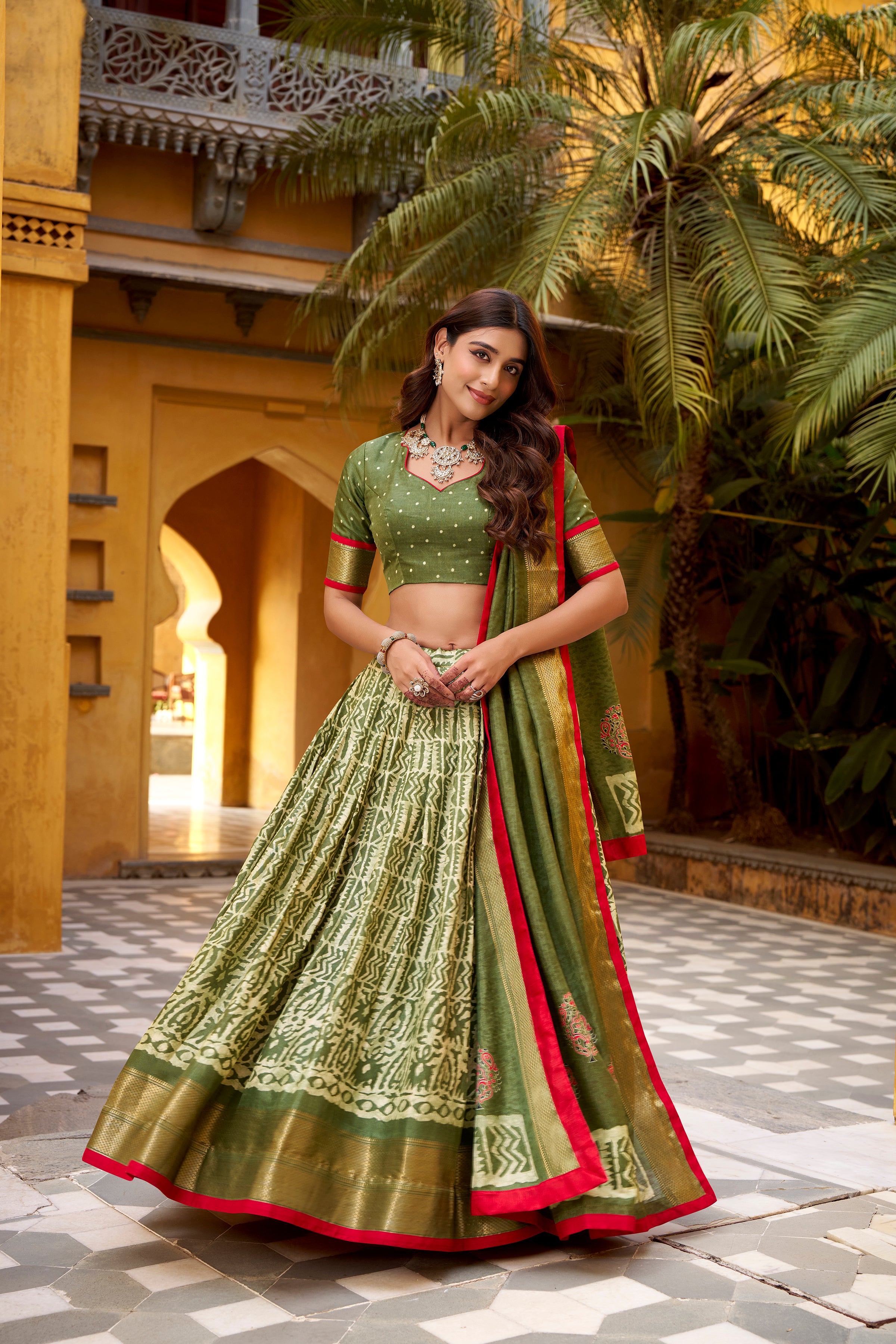 Girija Mehendi Green Dola Silk Batik Print With Zari
Weaving Work Lehenga Choli