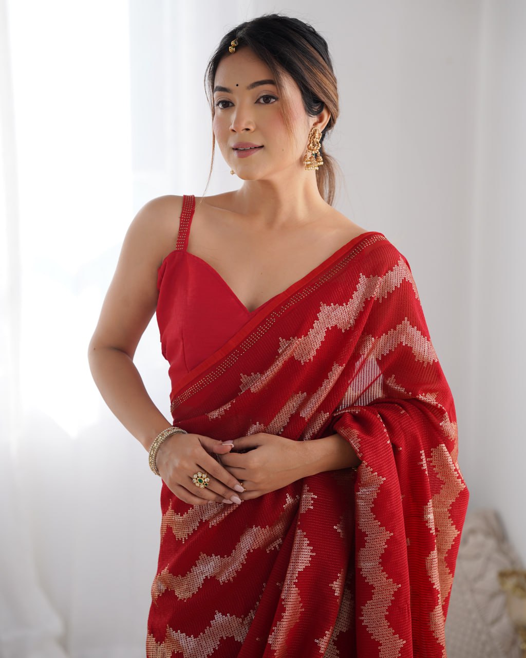 Red georgette saree with sequin & Seroski diamond work, bridal party wear saree with satin blouse, designer ethnic wear by Trinaari for weddings.