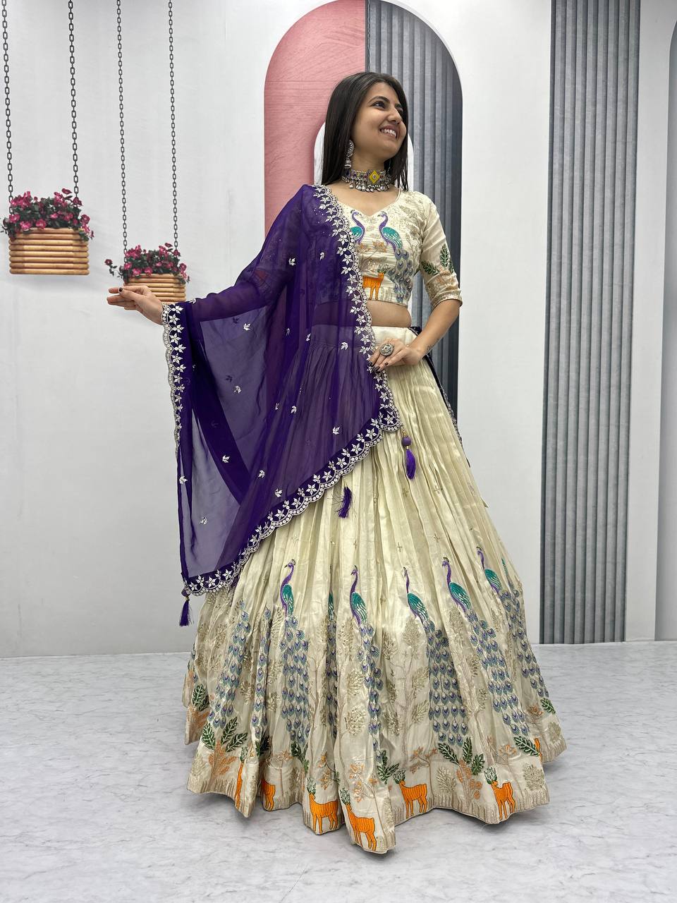 Tarini purple tissue silk embroidered lehenga choli
