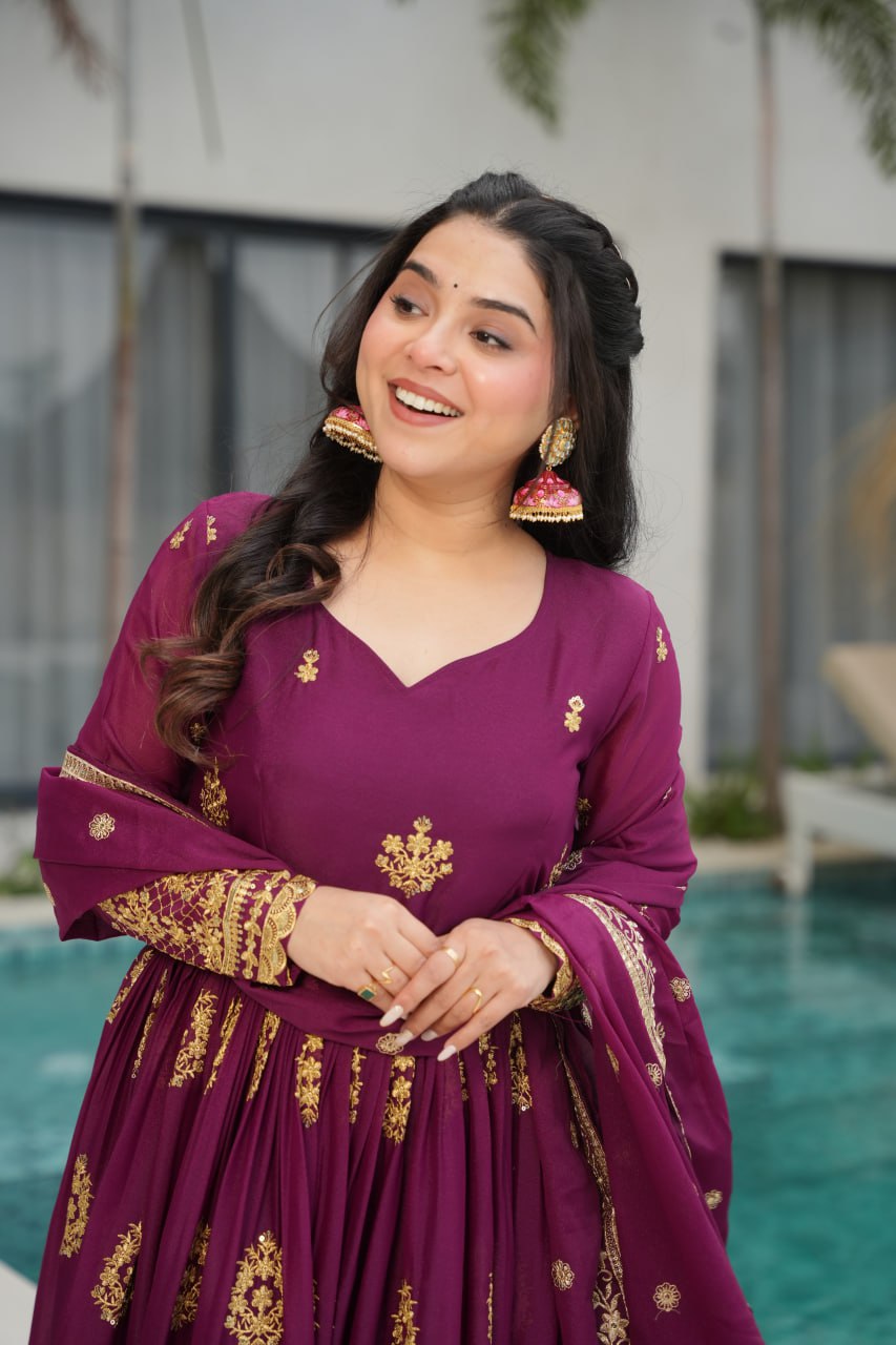 Rudrika Purple Embroidered Gown in soft Star Georgette with intricate zari and sequin work, full-length 56-inch flare gown with matching embroidered dupatta, elegant pan neck design, perfect for weddings and festive occasions