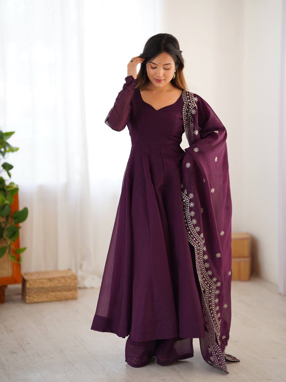 Tiya purple Fandy Silk Anarkali suit with 4.5-meter flair, full sleeves & embroidered dupatta – stitched & ready for weddings, parties & festive wear.
