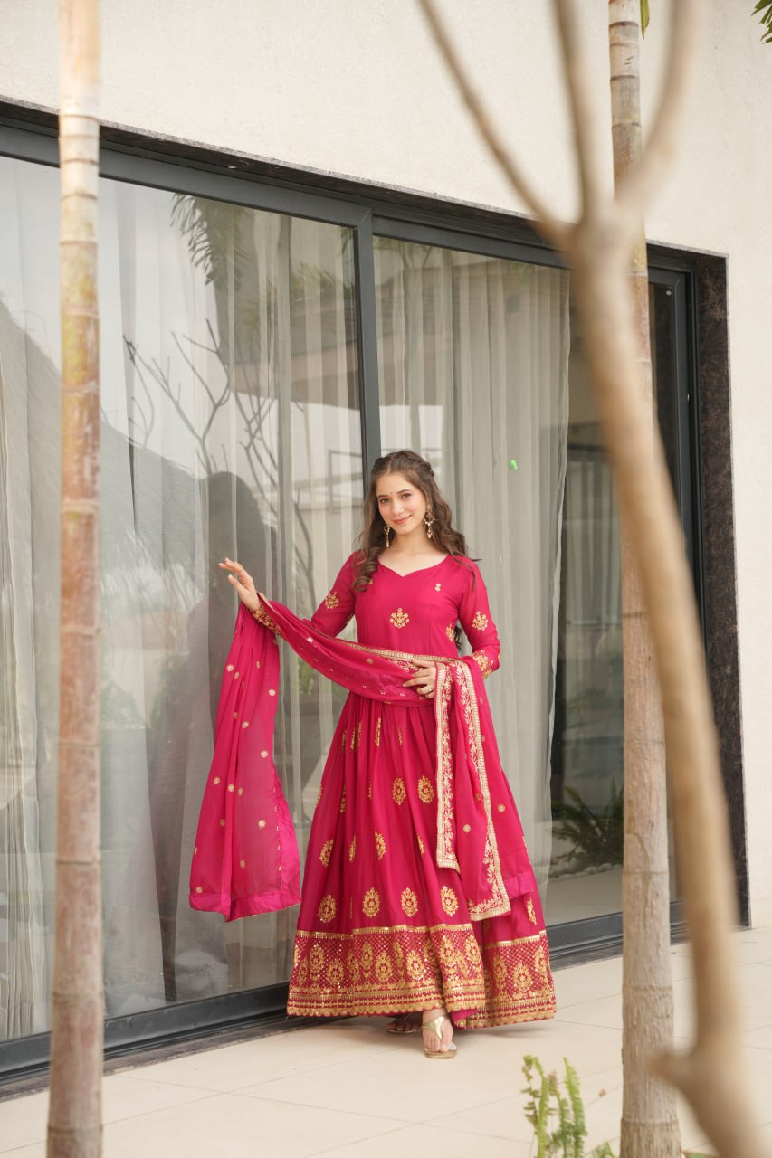 Rudrika Pink Embroidered Gown in soft Star Georgette with intricate zari and sequin work, full-length 56-inch flare gown with matching embroidered dupatta, elegant pan neck design, perfect for weddings and festive occasions