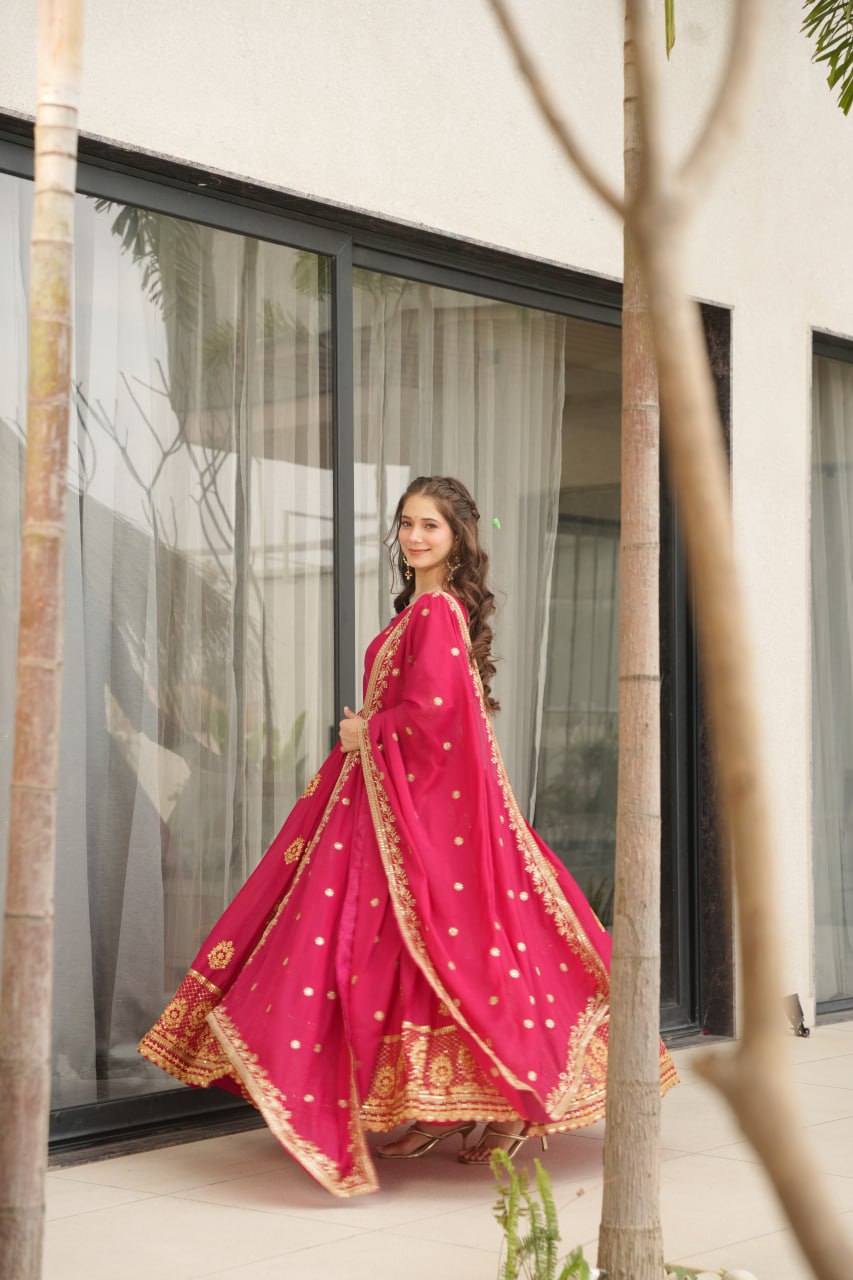 Rudrika Pink Embroidered Gown in soft Star Georgette with intricate zari and sequin work, full-length 56-inch flare gown with matching embroidered dupatta, elegant pan neck design, perfect for weddings and festive occasions