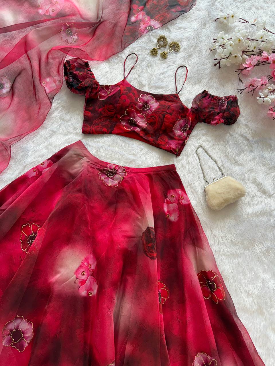 Red pure organza digital print zari work lehenga choli with batwa bag
