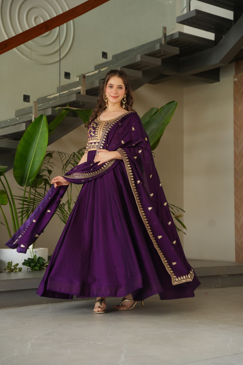 Aadishri Purple Vichitra Silk Gown with multi-sequins and zari embroidery – perfect Indian ethnic wear for weddings, party wear dresses for women, designer gown for women, traditional Indian dress, Indian clothing for women, ethnic wear for girls, gown for wedding function, Indian dress online shopping, full sleeve gown for women, festive wear for ladies.