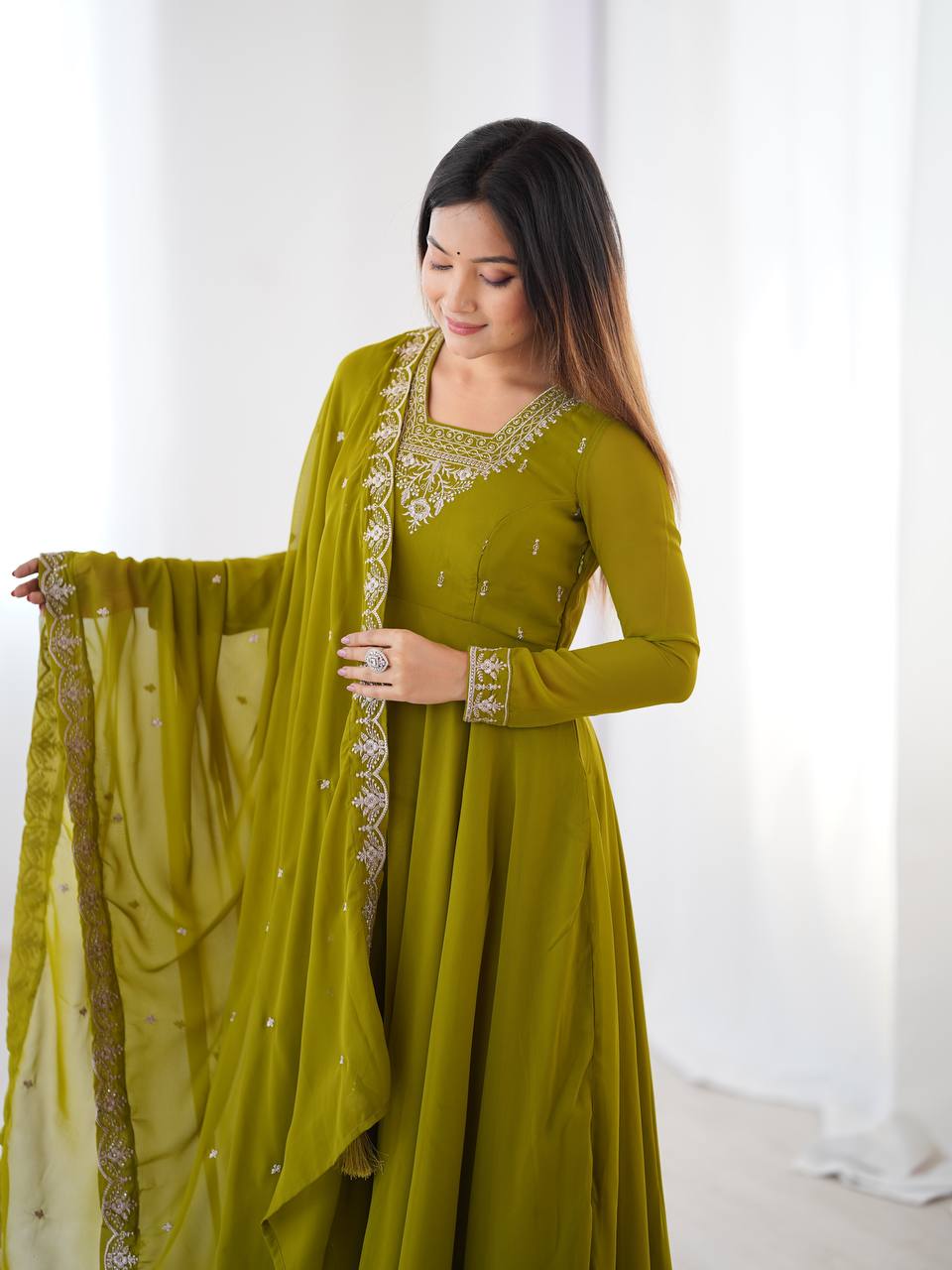 Green Anarkali suit in soft Fox Georgette with 6.5-meter flair, beads & zari embroidery, lace sleeves & dupatta – fully stitched & party-ready.