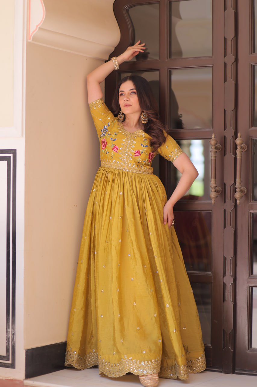Mustard Yellow Gold Crush gown with zari, sequins, and multi-thread embroidery, featuring V-neck and short sleeves – perfect for weddings and festive occasions