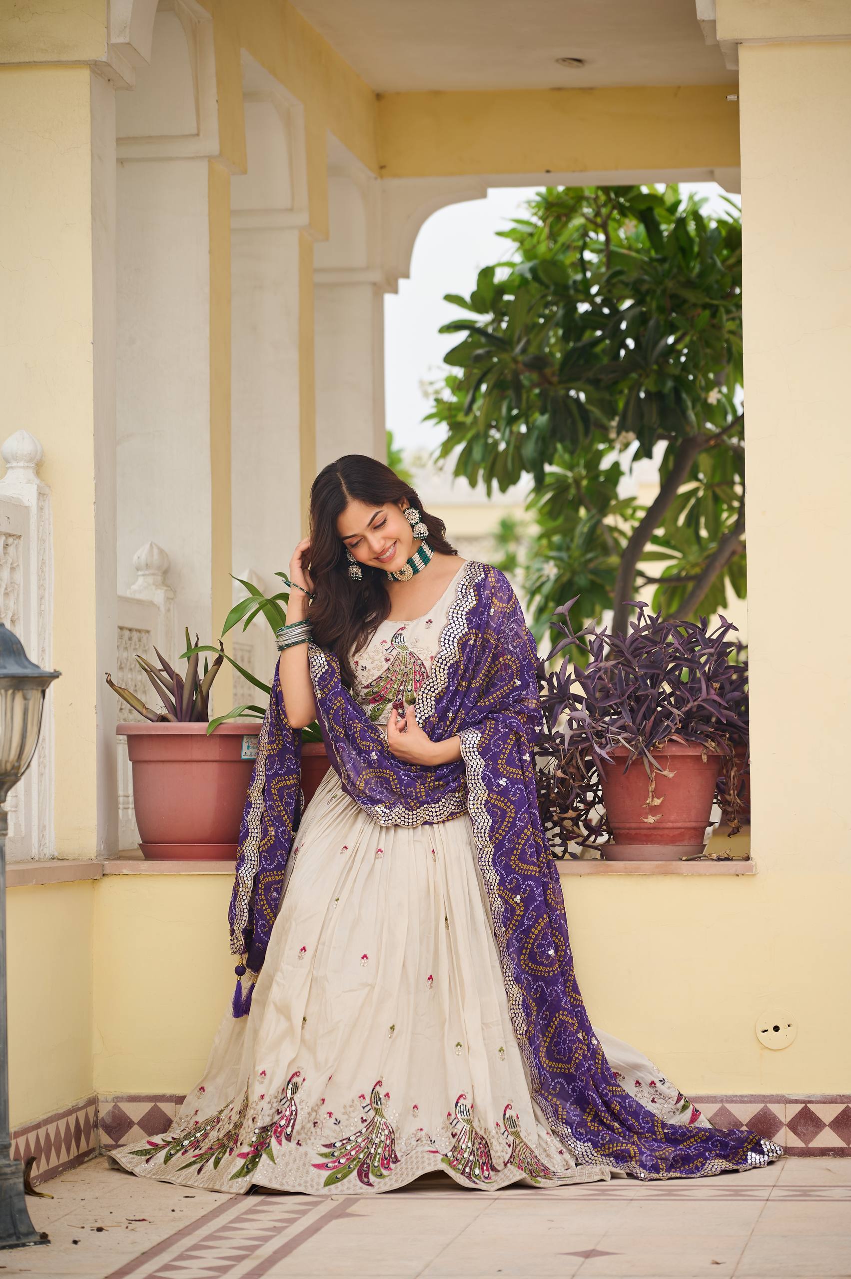 Amla Off-White Tissue Silk Sequins Thread Work Lehenga Choli with Purple Bandhej Dupatta
