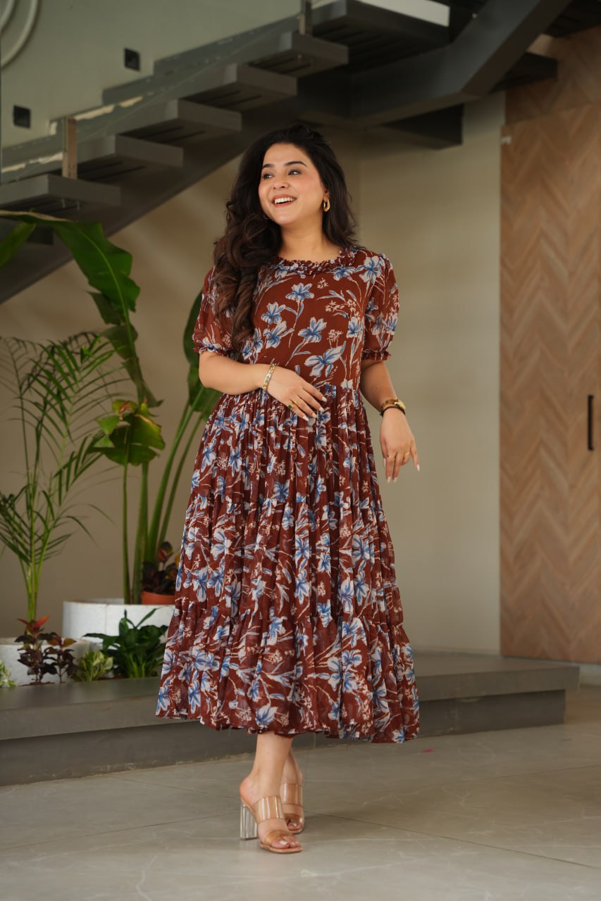 Vikarni Brown Printed Anarkali Gown in faux georgette with 12-meter flair & cotton lining – perfect for haldi, mehndi, festive & Indo-western occasions.
