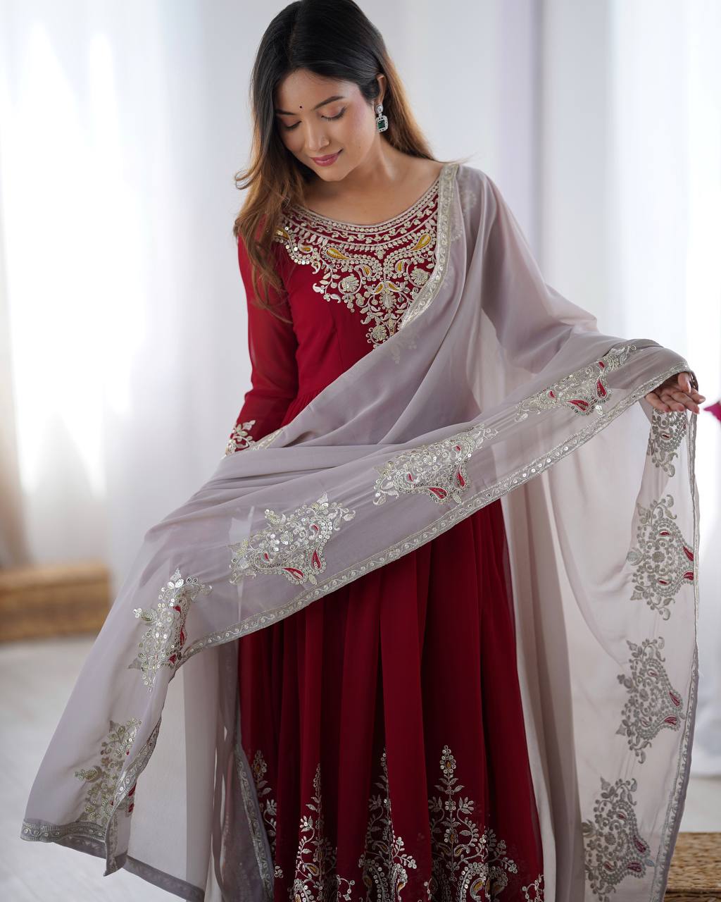 Tejvini Maroon Embroidered Gown Set – heavy georgette gown with multi-thread 5mm sequin embroidery, full sleeves, soft micro cotton lining, paired with matching maroon embroidered dupatta and stitched cotton bottom – ideal for weddings, festive events, and reception looks.
