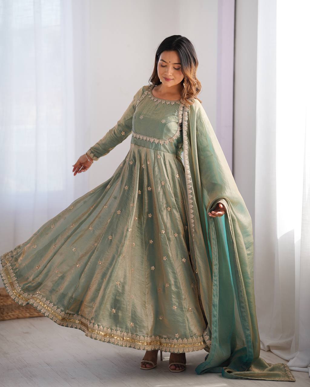 Neelika Sage Green Anarkali Suit Set – designer anarkali suit for women, green ethnic suit set, sequin embroidered gown dress, plus size Indian wear, traditional Indian outfits, wedding guest suit set, long anarkali gown with dupatta, stitched anarkali for party wear, green gown for haldi mehendi, readymade Indian suits for women.