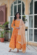 The Ridhvini Orange Pure Cotton Printed Anarkali Set is a stylish and breathable cotton Anarkali suit for women, perfect for daily wear, office wear, and festive occasions. Made from premium pure cotton, this readymade Anarkali kurta set offers comfort and elegance with a flowing silhouette, fancy V-neck, and full sleeves. Paired with straight cotton pants and a matching dupatta, this ethnic cotton suit is ideal for summer fashion. Whether you're looking for a lightweight festive outfit or a printed Anarkal