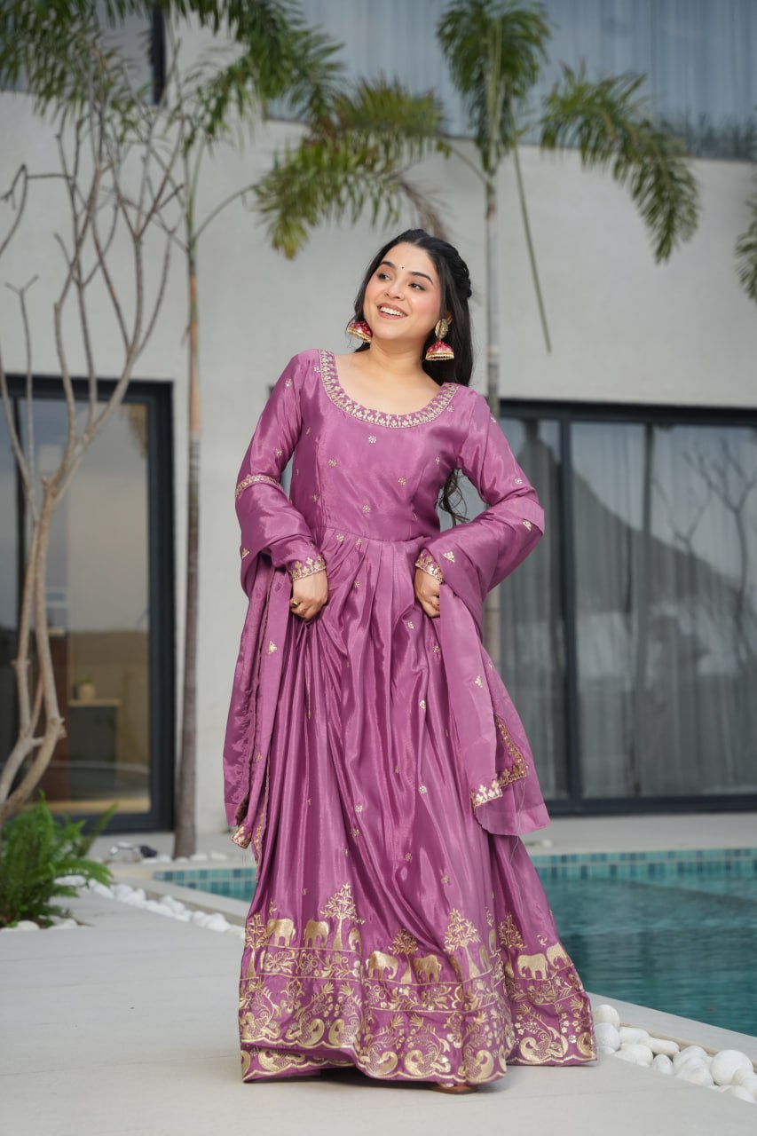 Harvisha mauve purple Chinon silk embroidered gown with full sleeves, floor-length 56-inch flair, rich sequin detailing, and matching embroidered dupatta – ideal Indian ethnic party gown for weddings, receptions, and festive occasions.