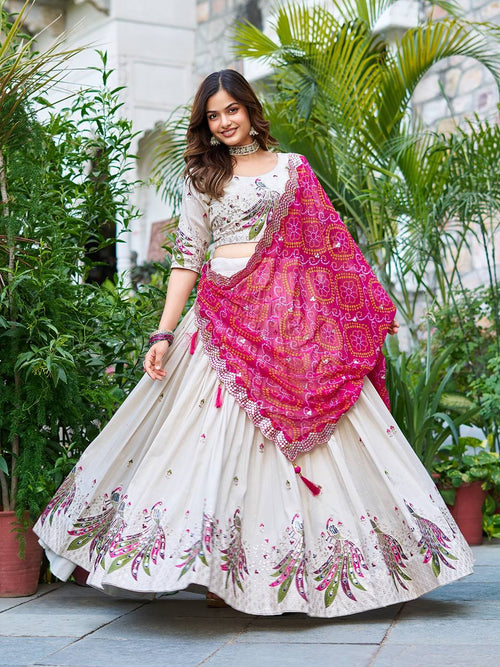 Amla off-white tissue silk lehenga choli with sequins thread work and pink Bandhej dupatta
