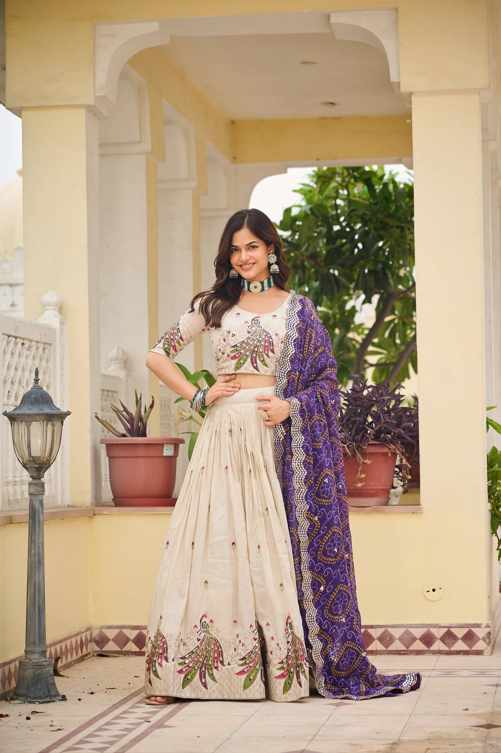 Amla Off-White Tissue Silk Sequins Thread Work Lehenga Choli with Purple Bandhej Dupatta
