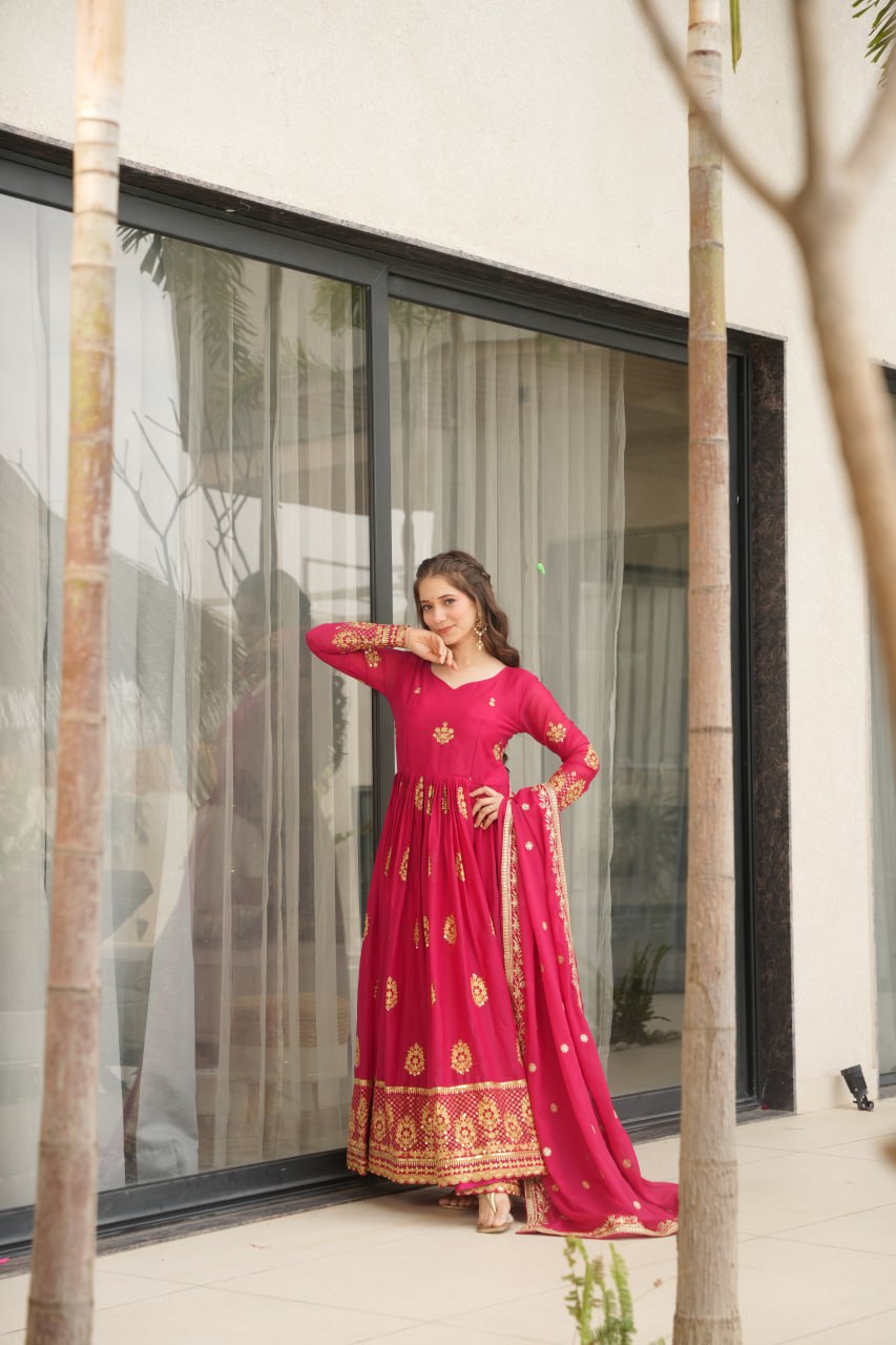 Rudrika Pink Embroidered Gown in soft Star Georgette with intricate zari and sequin work, full-length 56-inch flare gown with matching embroidered dupatta, elegant pan neck design, perfect for weddings and festive occasions