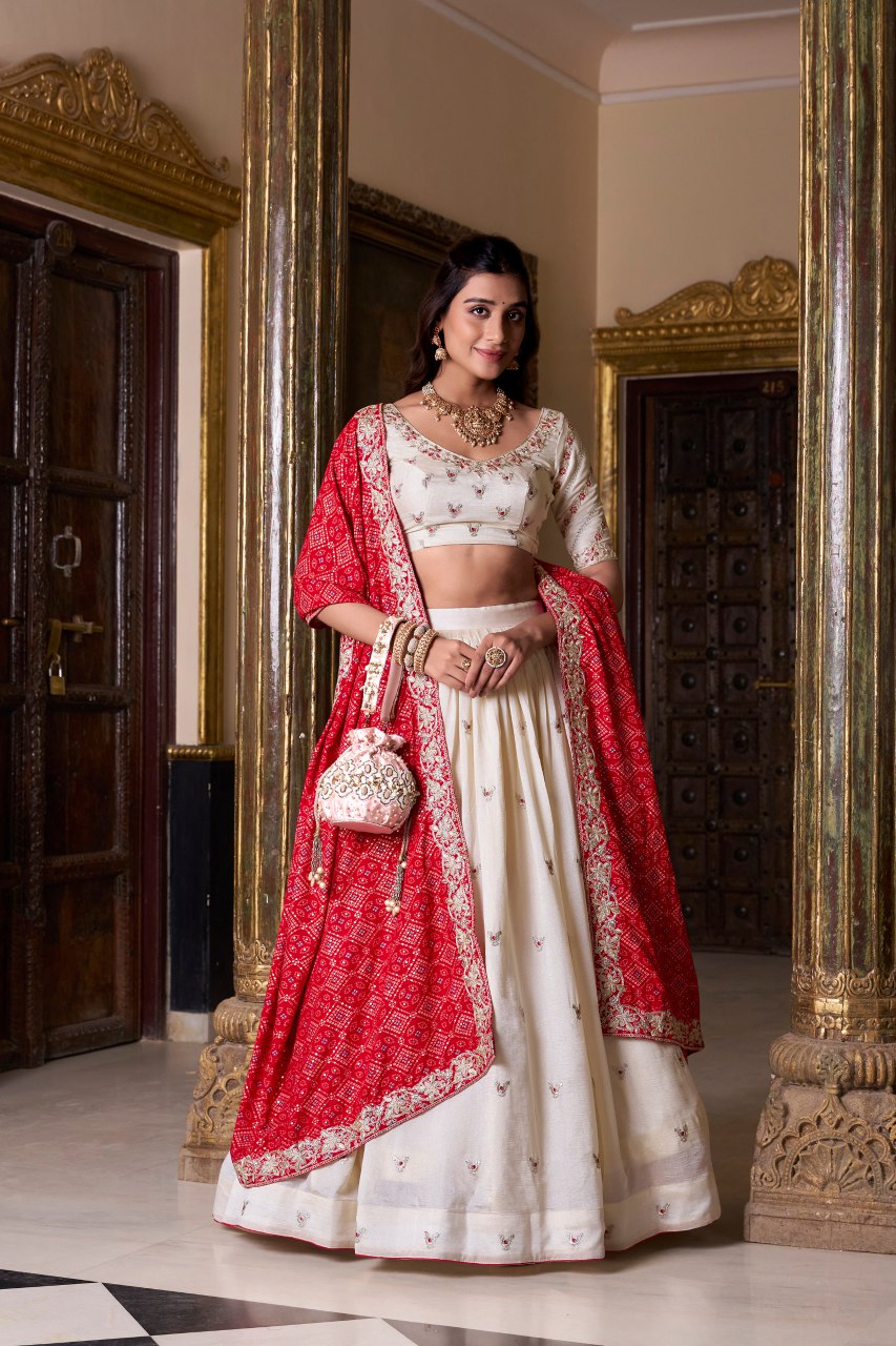 Off-white silk lehenga choli with embroidery and Bandhej print dupatta