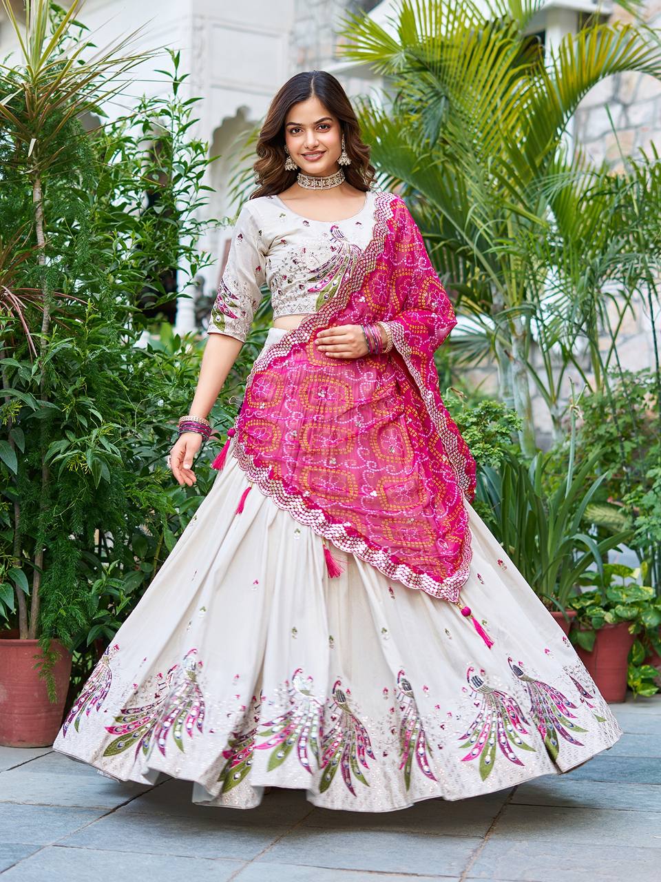 Amla Off-White Tissue Silk Sequins Thread Work Lehenga Choli with Pink Bandhej Dupatta