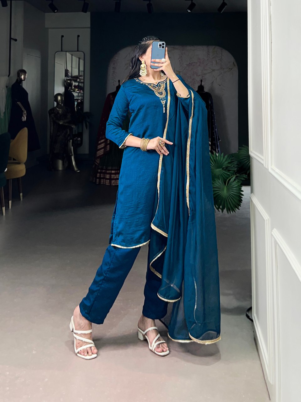 Teal blue Vichitra silk suit set featuring delicate handwork with beads and sequins, paired with an elegant organza dupatta – perfect for festive events and party wear.