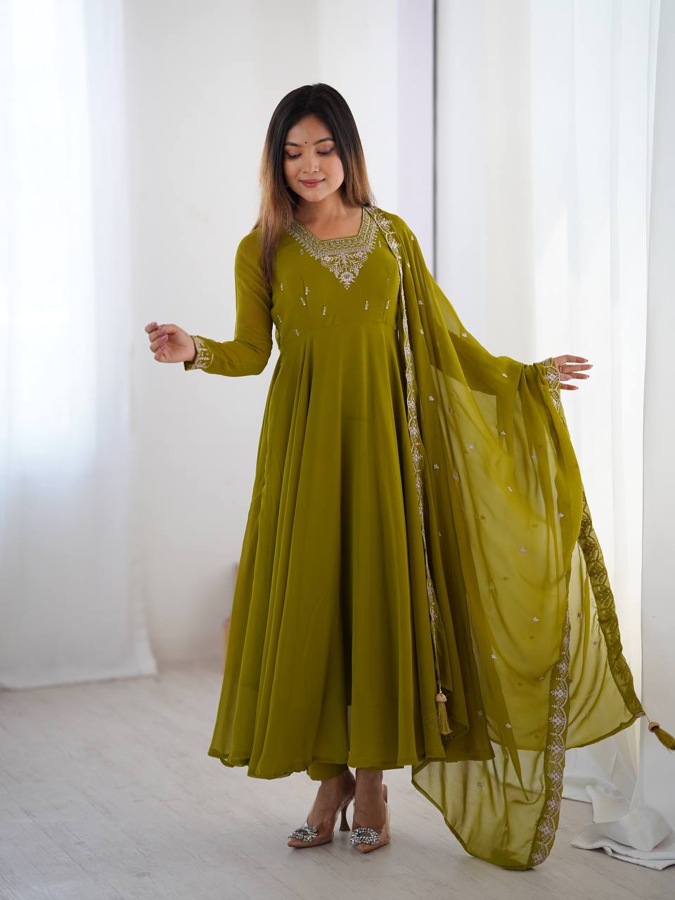 Green Anarkali suit in soft Fox Georgette with 6.5-meter flair, beads & zari embroidery, lace sleeves & dupatta – fully stitched & party-ready.