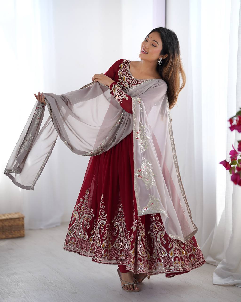 Tejvini Maroon Embroidered Gown Set – heavy georgette gown with multi-thread 5mm sequin embroidery, full sleeves, soft micro cotton lining, paired with matching maroon embroidered dupatta and stitched cotton bottom – ideal for weddings, festive events, and reception looks.
