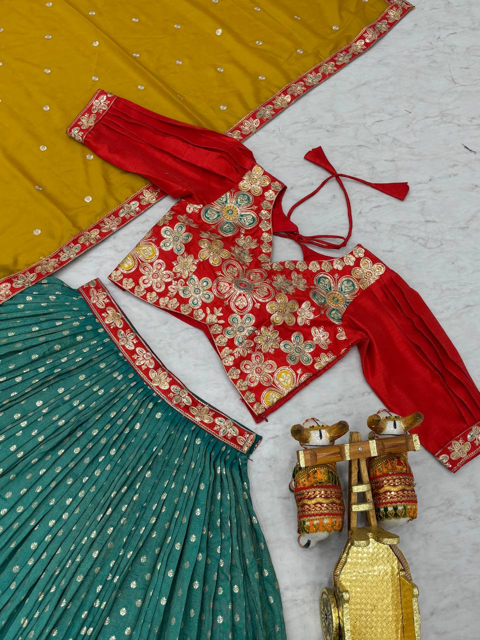 Multicolour silk lehenga choli set with heavy embroidery, sequin, and cording work; includes stitched shimmer lehenga, fully stitched mono silk choli, and embroidered georgette dupatta – perfect for weddings and festive occasions