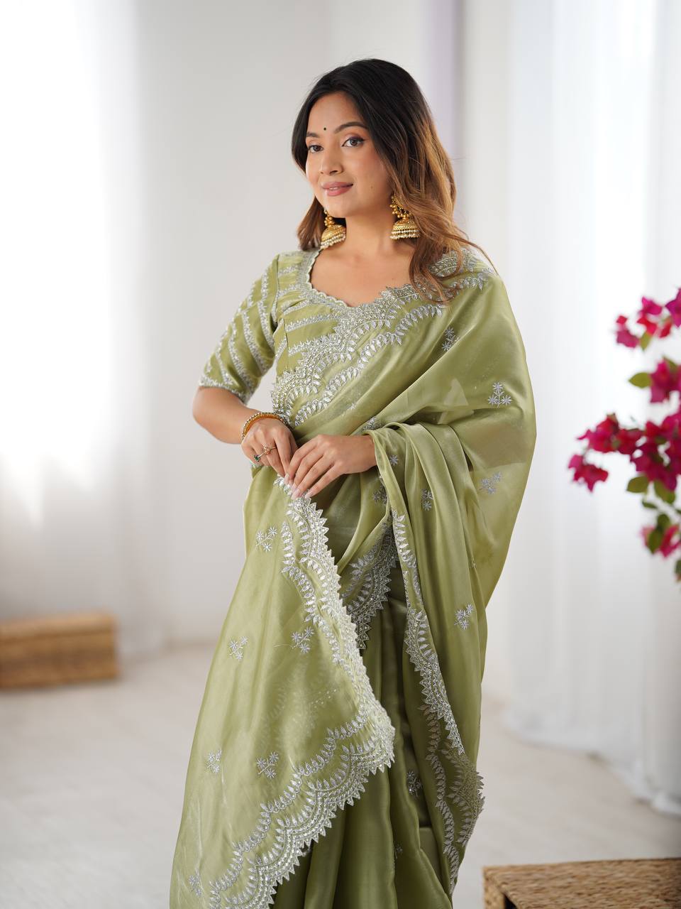 Vikatya pista green Jimmy Choo fabric saree with sequin-thread embroidery & unstitched blouse—perfect for weddings, festivals & party wear.