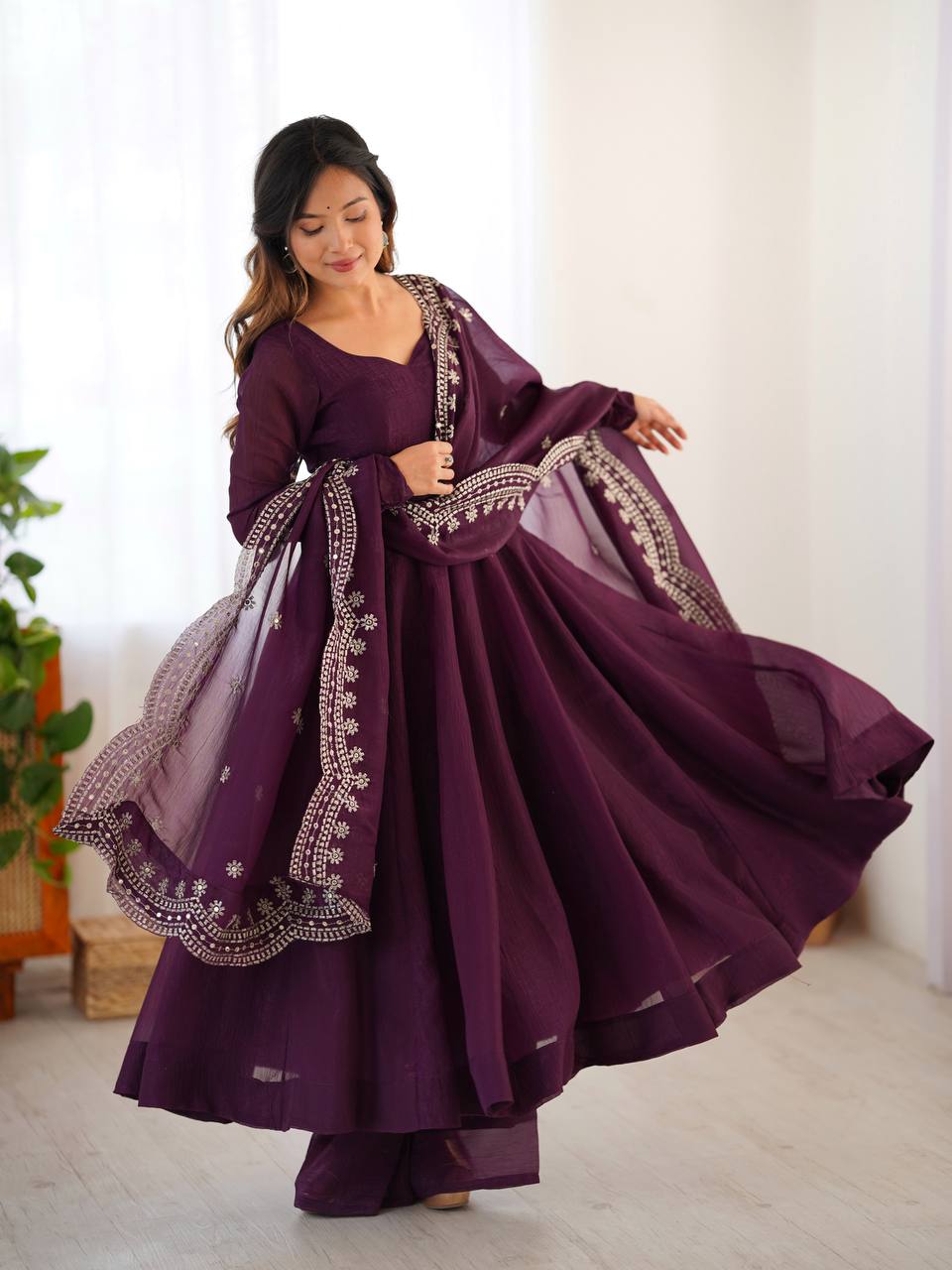 Tiya purple Fandy Silk Anarkali suit with 4.5-meter flair, full sleeves & embroidered dupatta – stitched & ready for weddings, parties & festive wear.
