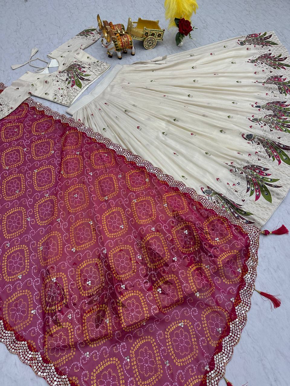 Amla Off-White Tissue Silk Sequins Thread Work Lehenga Choli with Pink Bandhej Dupatta