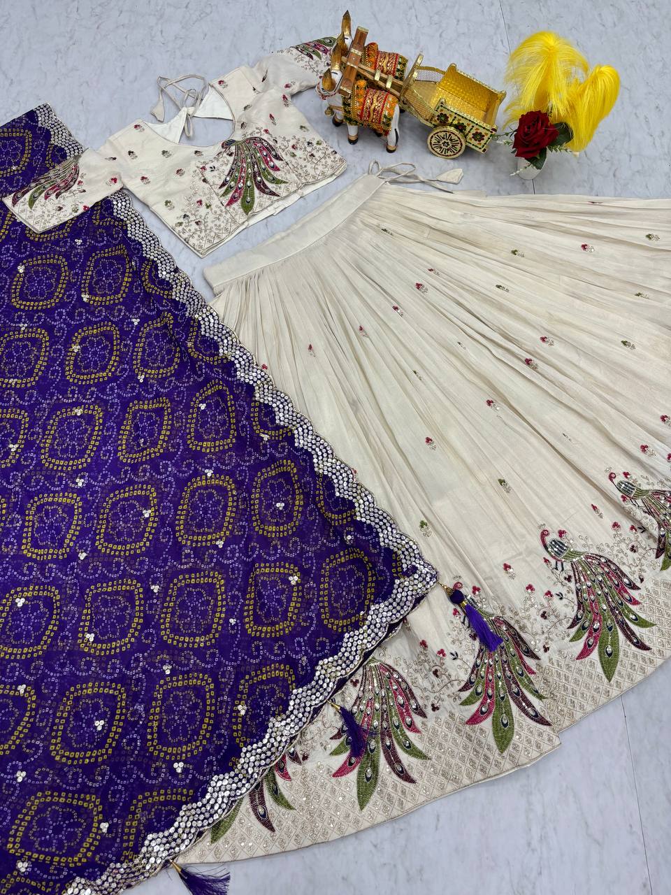 Amla Off-White Tissue Silk Sequins Thread Work Lehenga Choli with Purple Bandhej Dupatta