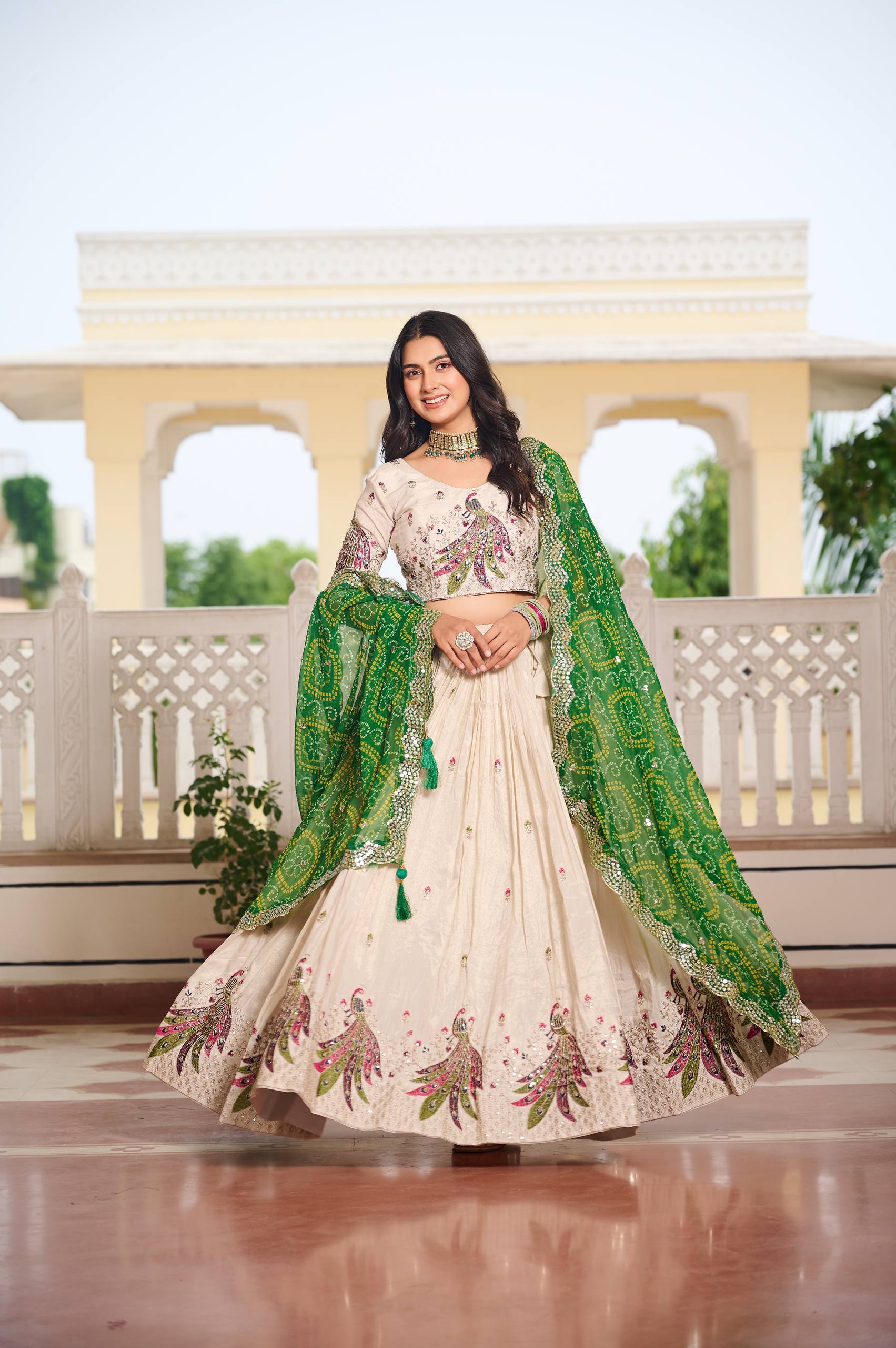 Amla Off-White Tissue Silk Sequins Thread Work Lehenga Choli with Green Bandhej Dupatta