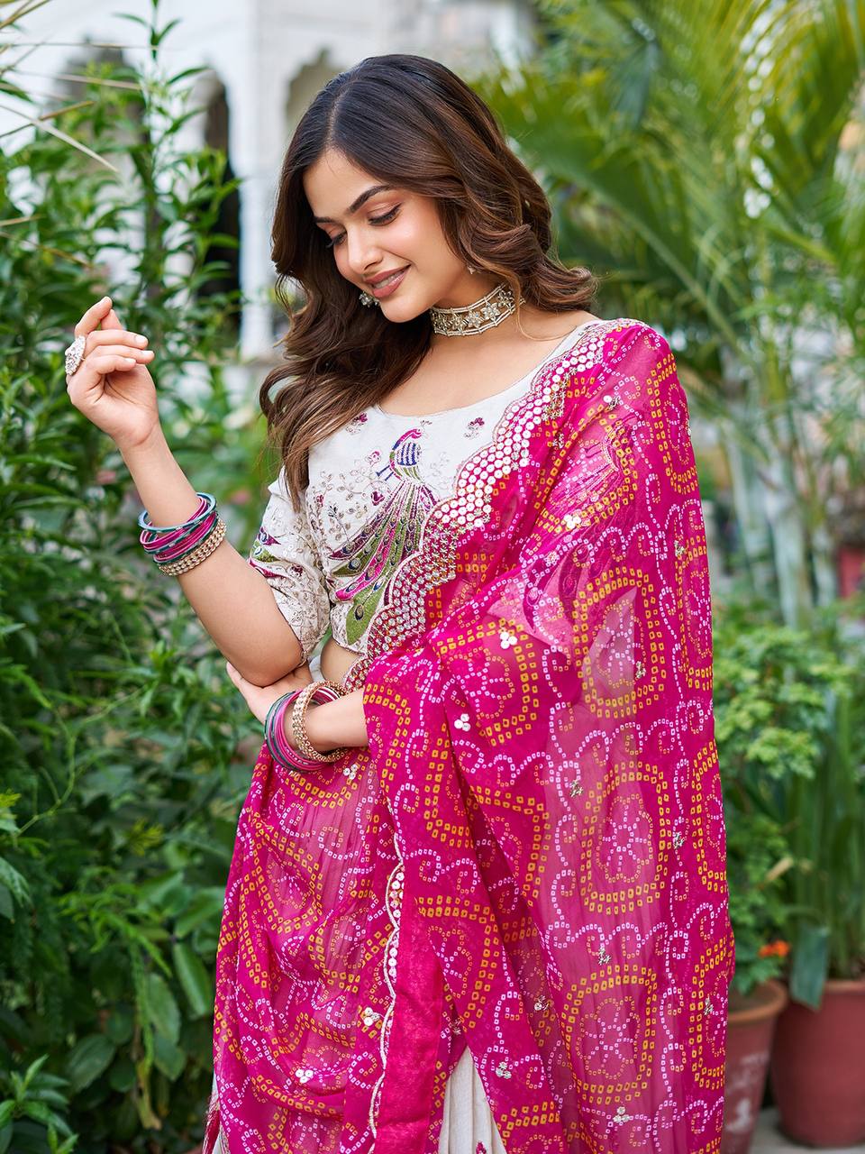 Amla Off-White Tissue Silk Sequins Thread Work Lehenga Choli with Pink Bandhej Dupatta