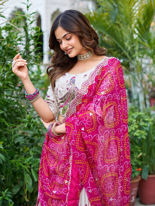 Amla off-white tissue silk lehenga choli with sequins thread work and pink Bandhej dupatta