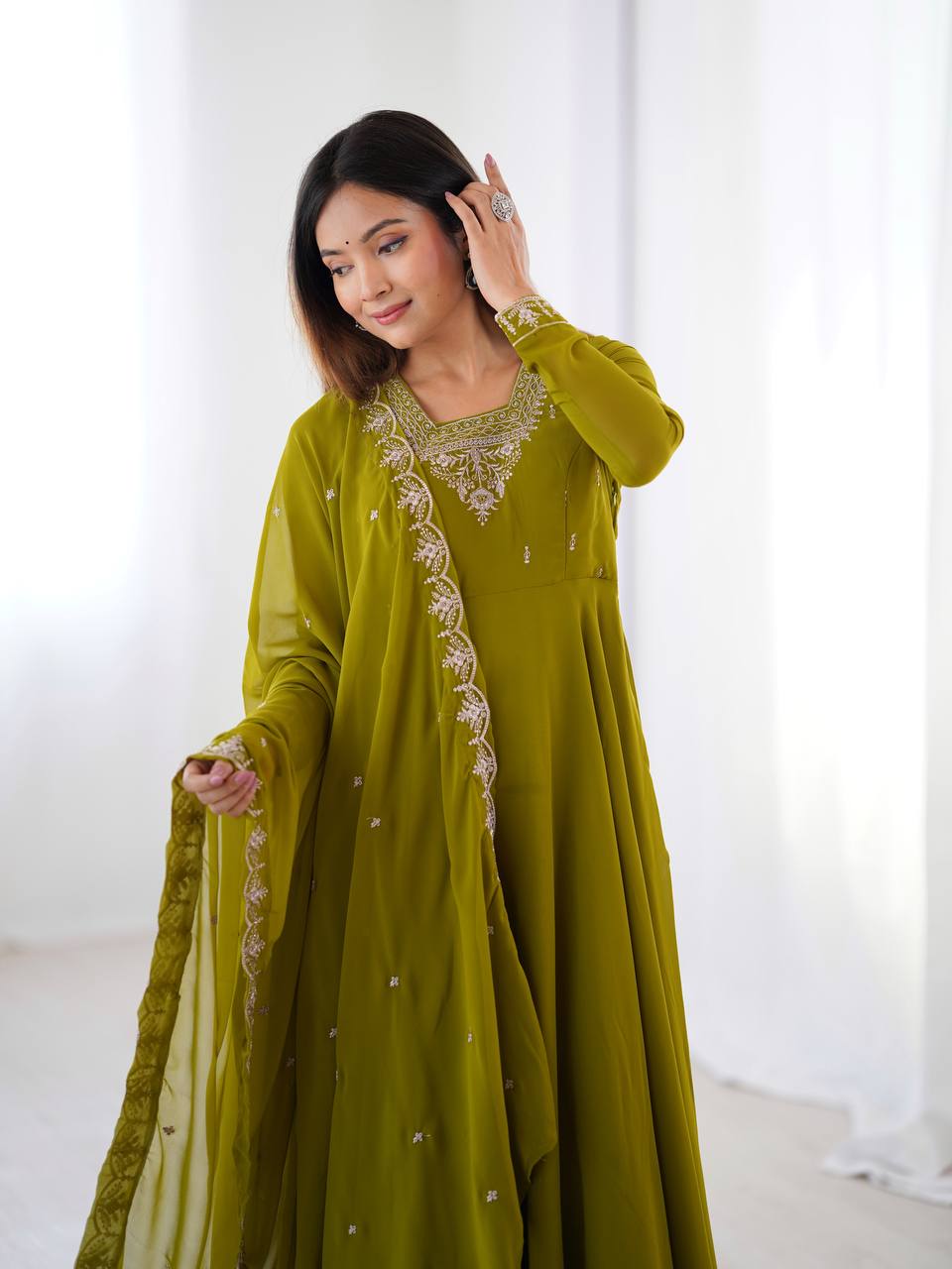 Green Anarkali suit in soft Fox Georgette with 6.5-meter flair, beads & zari embroidery, lace sleeves & dupatta – fully stitched & party-ready.