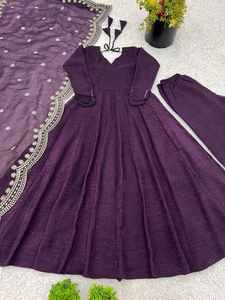 Tiya purple Fandy Silk Anarkali suit with 4.5-meter flair, full sleeves & embroidered dupatta – stitched & ready for weddings, parties & festive wear.