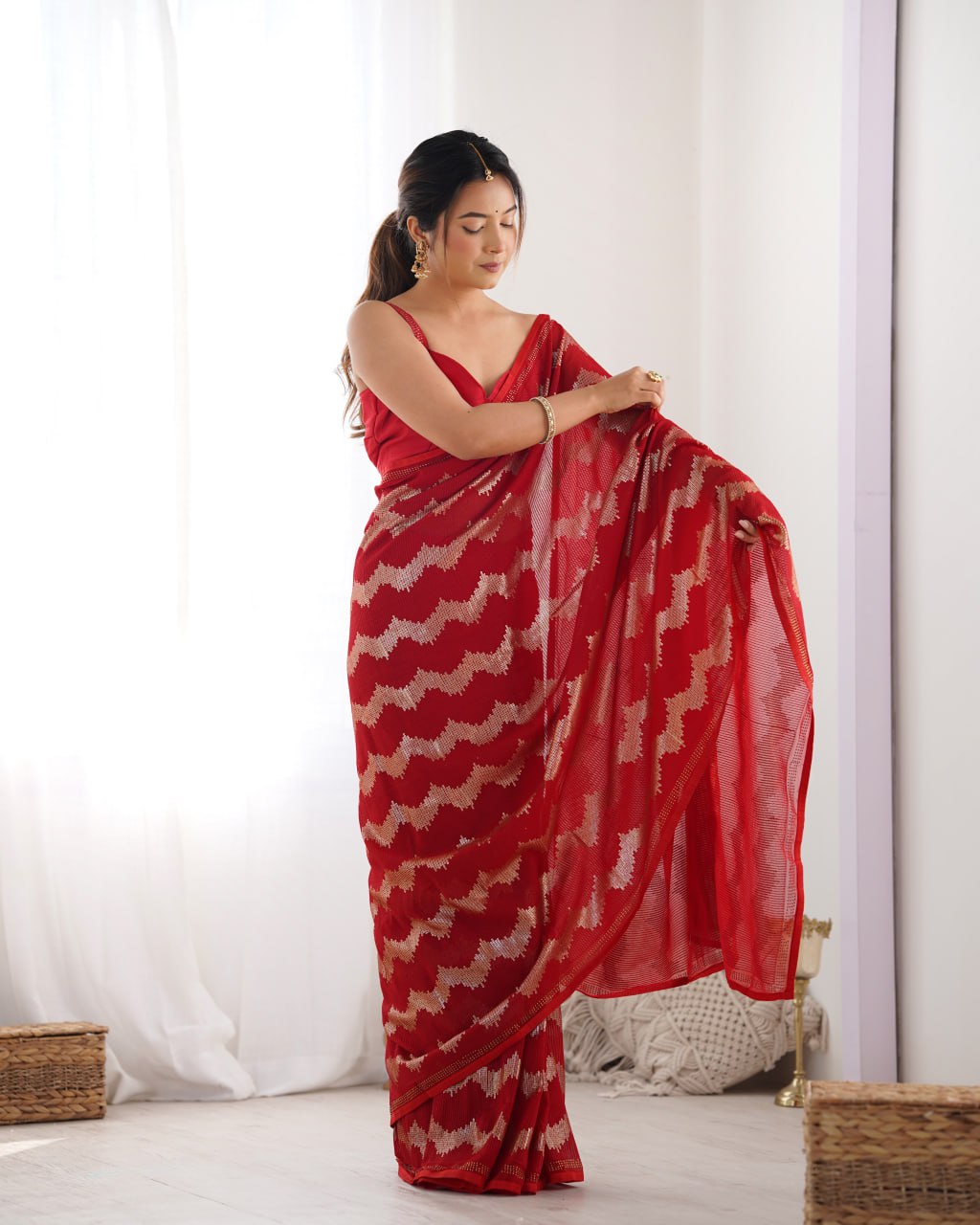 Red georgette saree with sequin & Seroski diamond work, bridal party wear saree with satin blouse, designer ethnic wear by Trinaari for weddings.