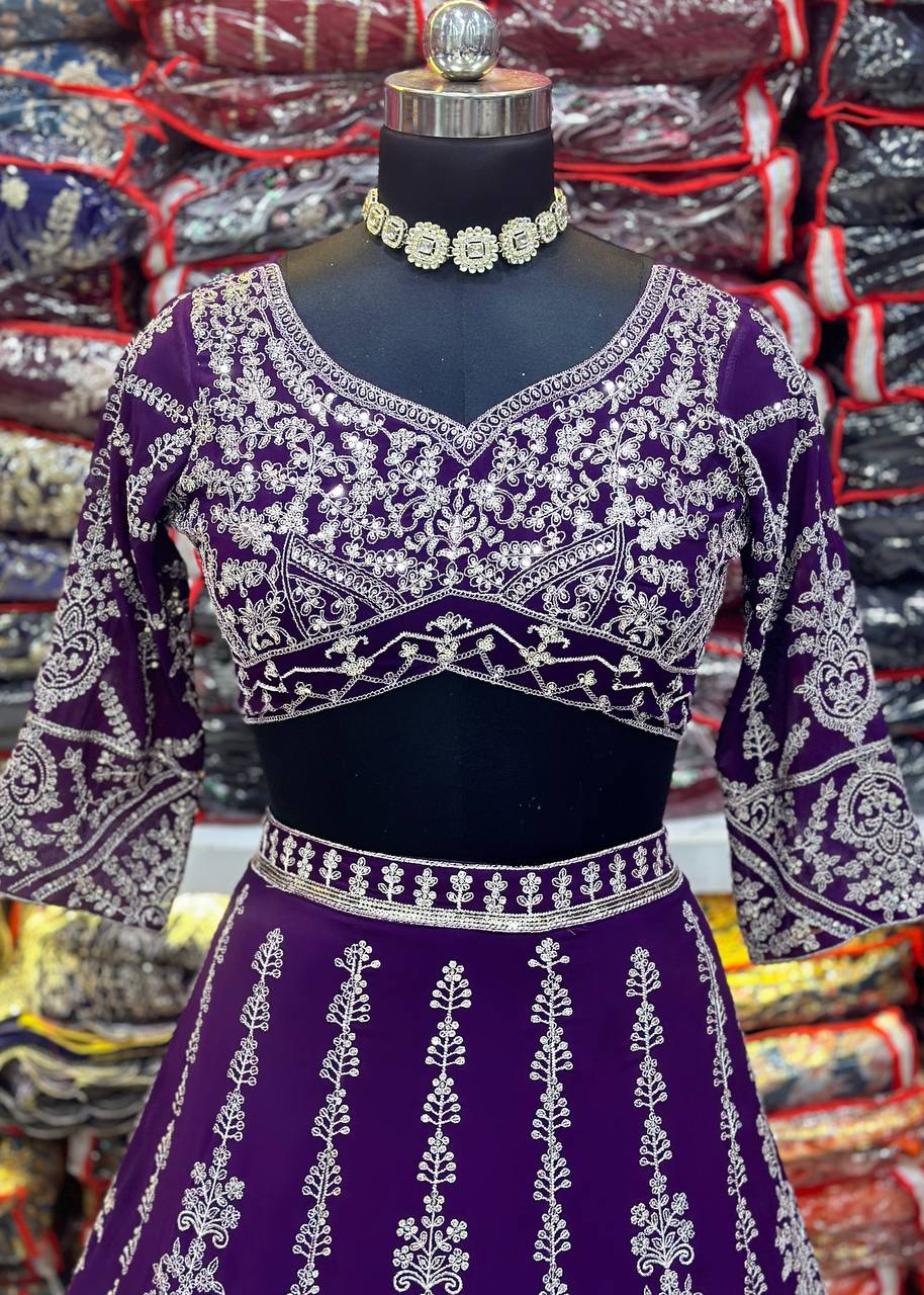 Purple georgette sequins embroidered lehenga choli with net dupatta