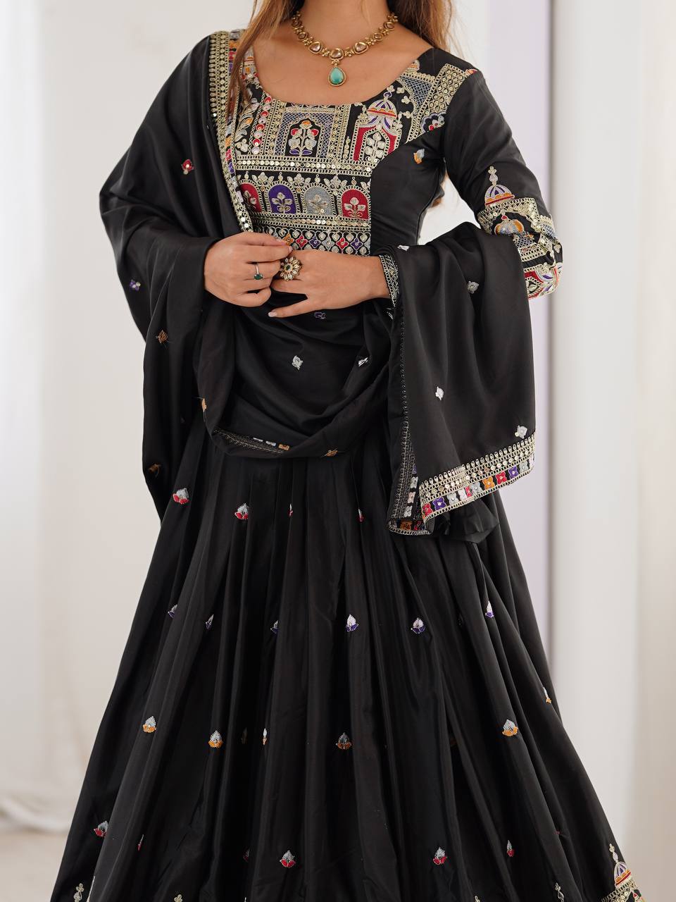 Kavyani Black Natural Crepe Silk Lehenga Choli Set – semi-stitched lehenga with 3-meter flare, canvas patta, cancan, and heavy embroidery in coding dori, thread, and sequins; paired with embroidered dupatta and unstitched matching choli – perfect for weddings, receptions, Diwali, and festive occasions.