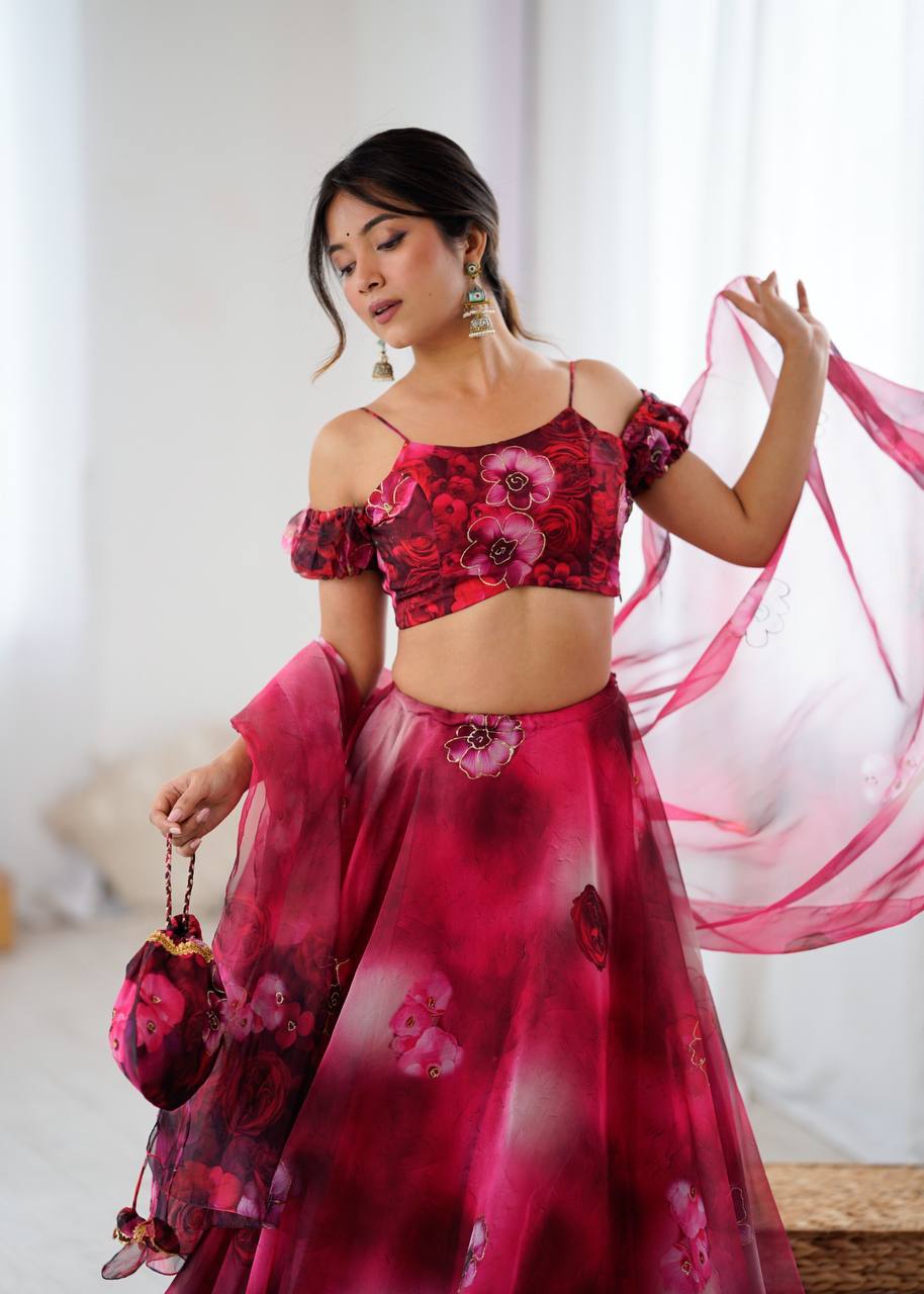Red pure organza digital print zari work lehenga choli with batwa bag