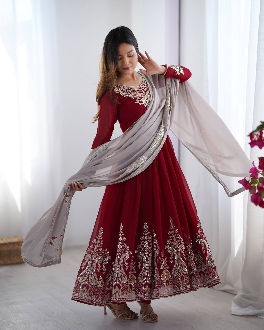 Tejvini Maroon Embroidered Gown Set – heavy georgette gown with multi-thread 5mm sequin embroidery, full sleeves, soft micro cotton lining, paired with matching maroon embroidered dupatta and stitched cotton bottom – ideal for weddings, festive events, and reception looks.