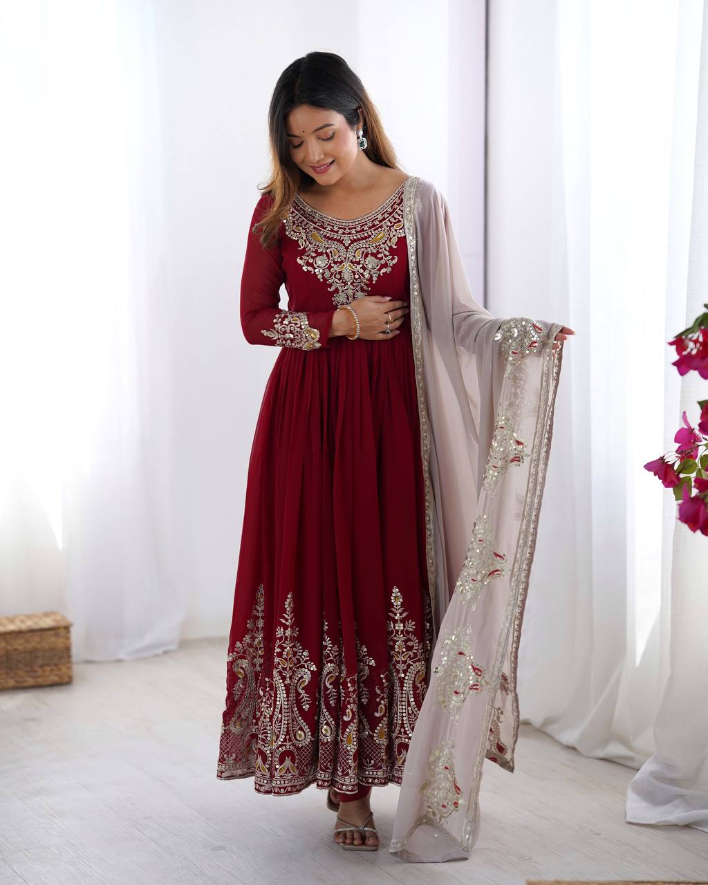 Tejvini Maroon Embroidered Gown Set – heavy georgette gown with multi-thread 5mm sequin embroidery, full sleeves, soft micro cotton lining, paired with matching maroon embroidered dupatta and stitched cotton bottom – ideal for weddings, festive events, and reception looks.