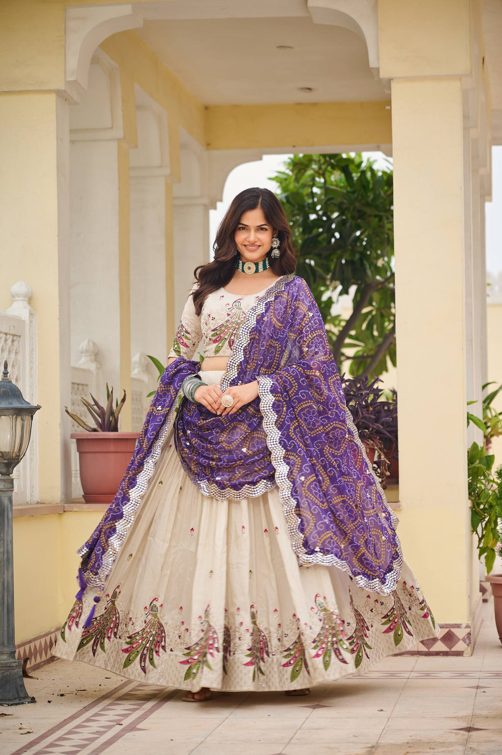 Amla Off-White Tissue Silk Sequins Thread Work Lehenga Choli with Purple Bandhej Dupatta